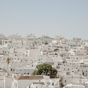 Beautiful view of short white buildings under a clear blue sky